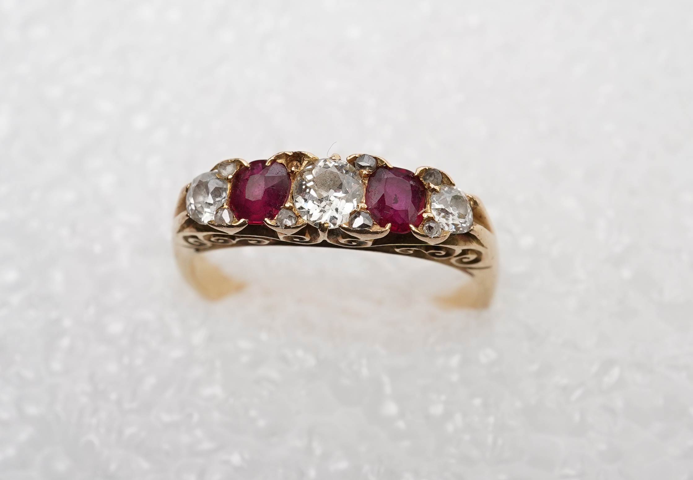 A ruby and diamond five-stone ring, early 20th century